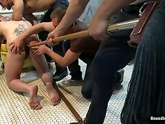 The wrestler gets gang banged by a horny crowd in a public restroom for losing his match.