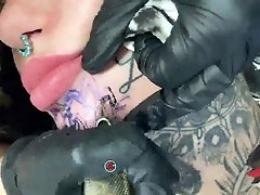 Amber Luke Getting a Chin Tattoo