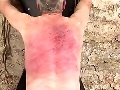 Man whipping with singletail snakewhip