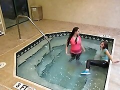 Clothed Lesbians in Indoor Pool