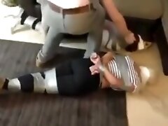 Two girls tied and gagged with tape
