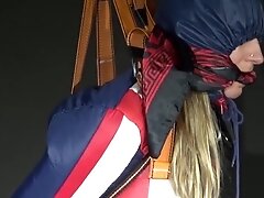 Watching Sexy Sandra Wearing A Sexy Oldschool Downbib And A Down Jacket Being Suspended, Tied, Gagged And Hooded With Ropes And A Ballgag (Video)