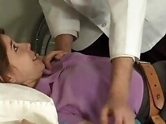 Doctor fondling his bound patient
