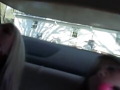 Two girls in backseat bondage